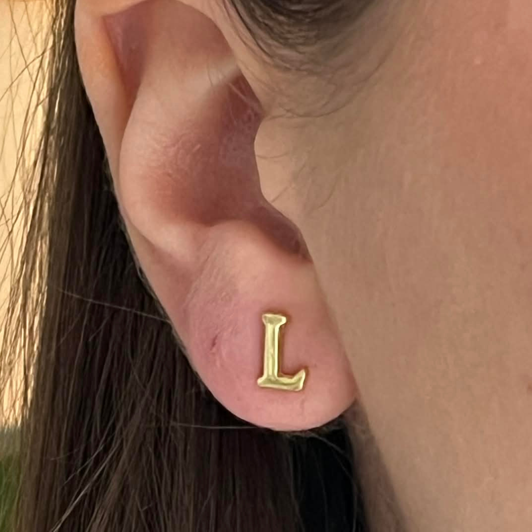 GULDPLÄTERAD BOKSTAV